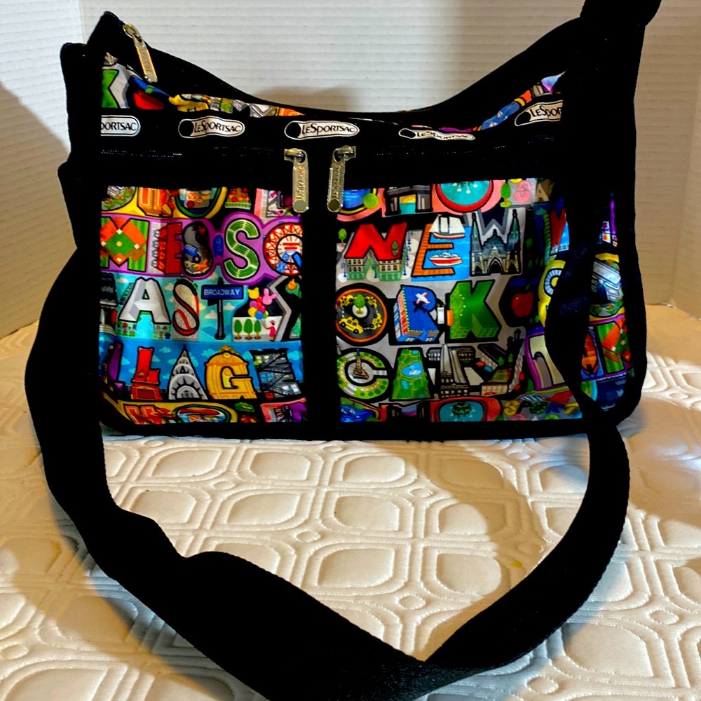 Gently used RARE Lesportsac bag with colourful New York design, and makeup bag
